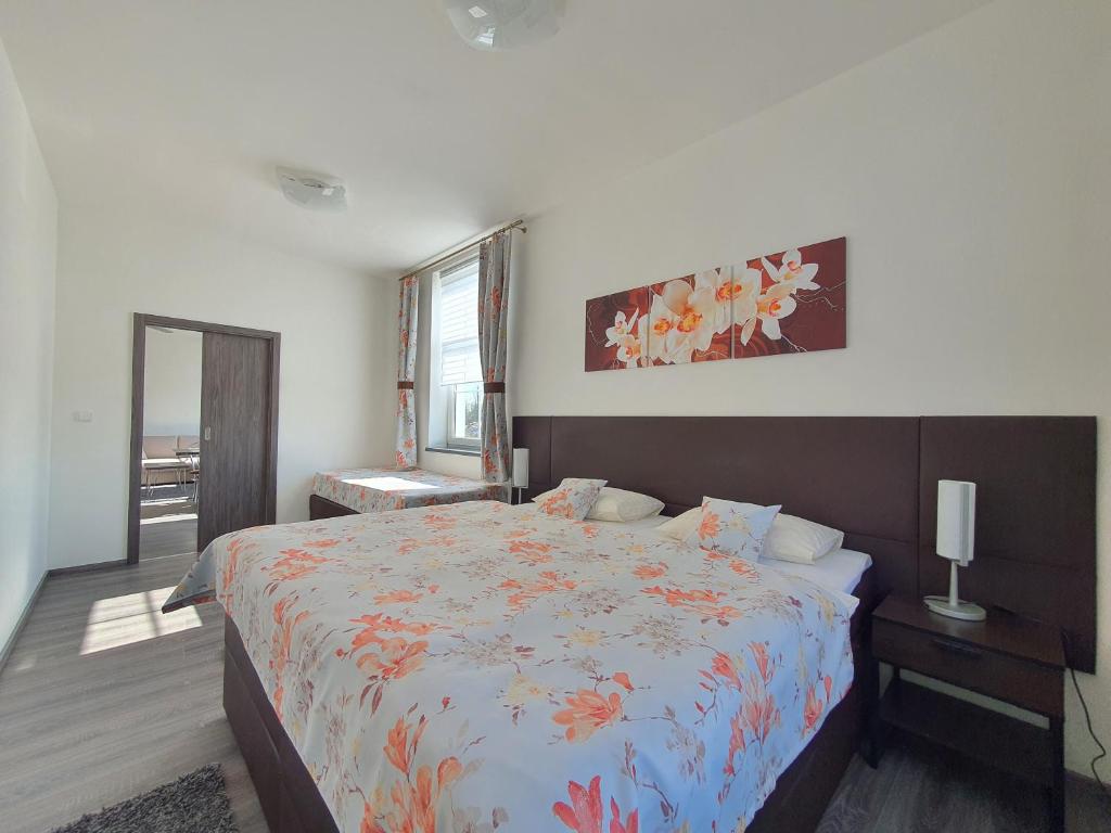 Postel nebo postele na pokoji v ubytování Apartmá na Hané