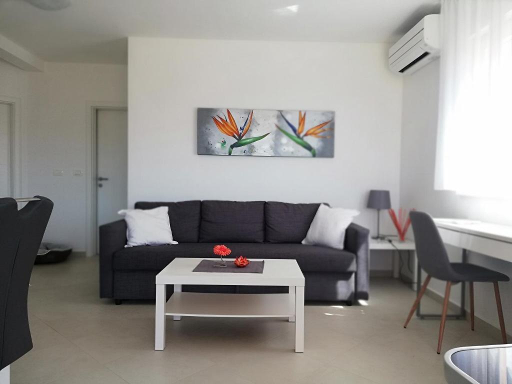 Posezení v ubytování Apartments Oleander Lovrečica-residence with pool