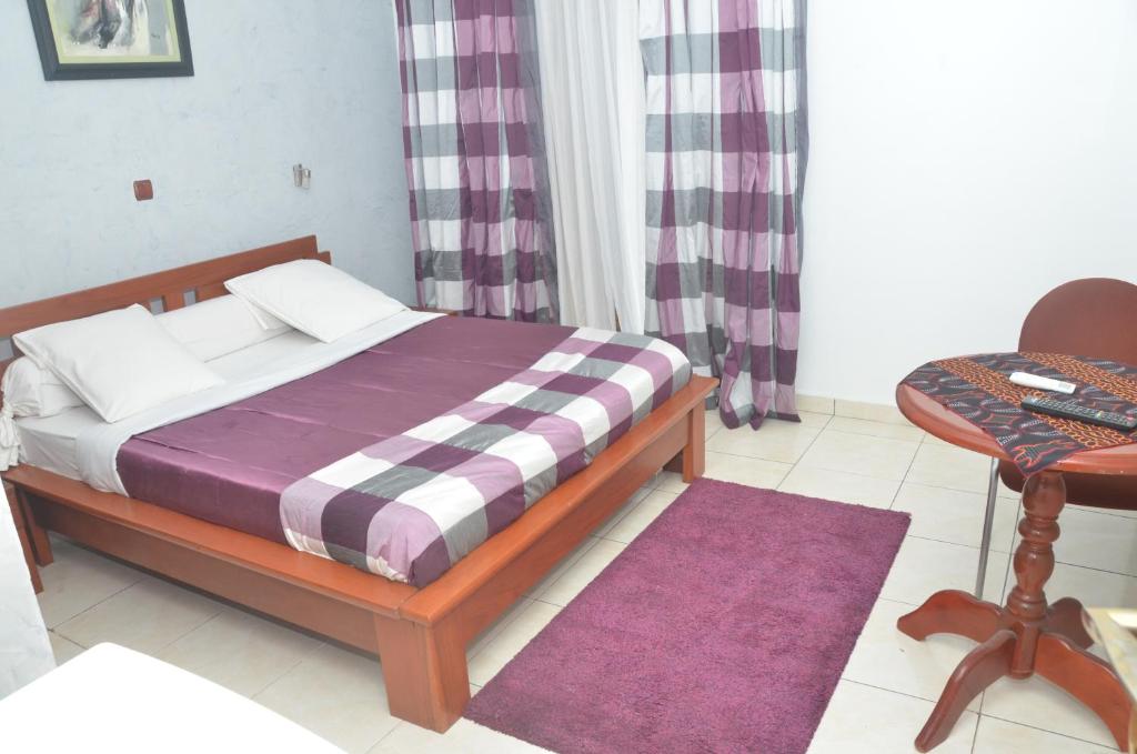 Postel nebo postele na pokoji v ubytování Hotel - Y