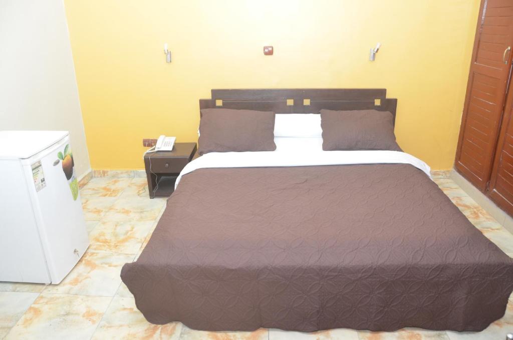 Postel nebo postele na pokoji v ubytování Hotel - Y