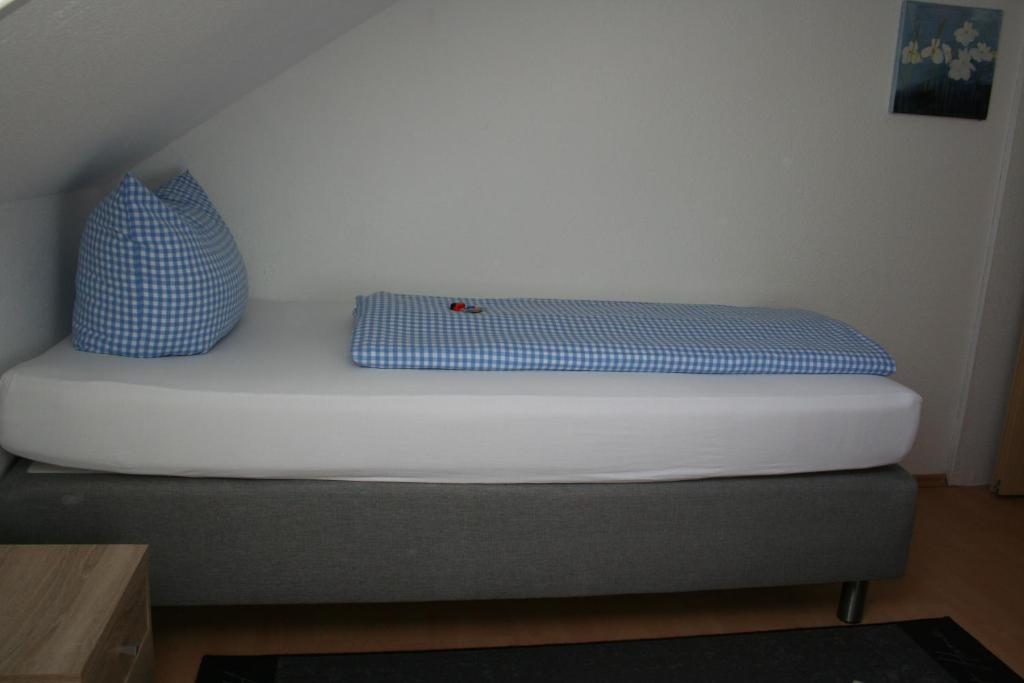 Postel nebo postele na pokoji v ubytování Gasthof Berg