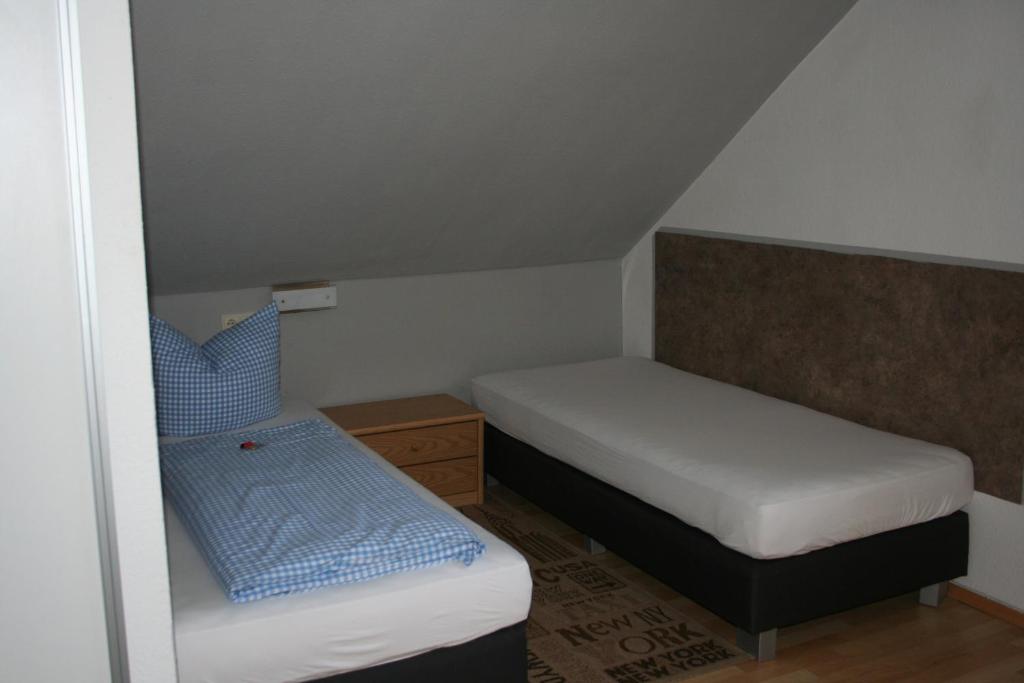 Postel nebo postele na pokoji v ubytování Gasthof Berg