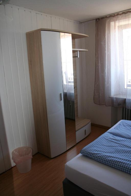 Postel nebo postele na pokoji v ubytování Gasthof Berg