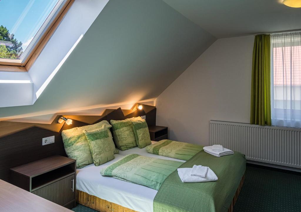 Postel nebo postele na pokoji v ubytování Babi Guesthouse - Babi Vendégház