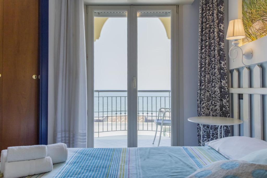 Postel nebo postele na pokoji v ubytování Hotel Alba