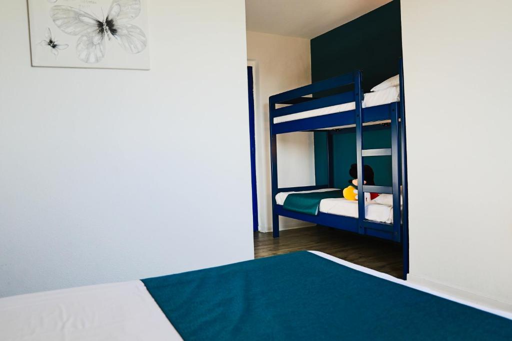Postel nebo postele na pokoji v ubytování Audotel