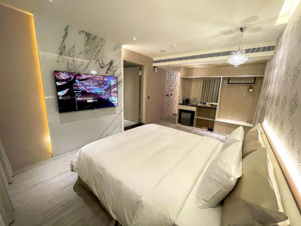 Postel nebo postele na pokoji v ubytování Fifth Avenue Motel