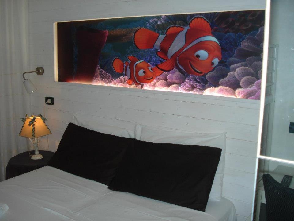 Postel nebo postele na pokoji v ubytování Hotel Alba