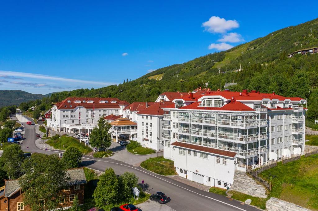 an aerial view of a town in the mountains at Dr. Holms Hotel in Geilo