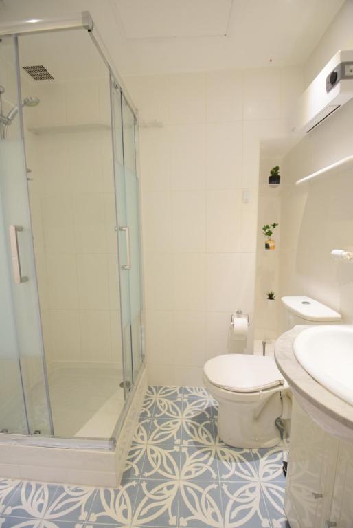 a bathroom with a shower and a toilet and a sink at Nice Renting - BARILLERIE - COZY LOFT OLD NICE - SEA FRONT - SALEYA - MASSENA in Nice