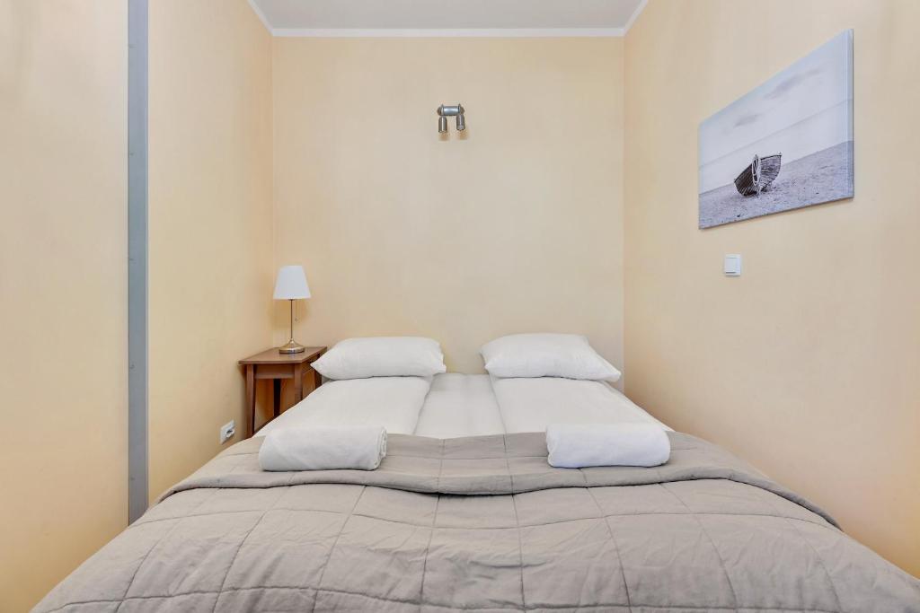 Posteľ alebo postele v izbe v ubytovaní Grand Apartments - Neptun Park Jelitkowo - Prowansja