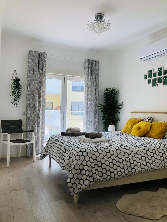 Postel nebo postele na pokoji v ubytování Casa de Oksana
