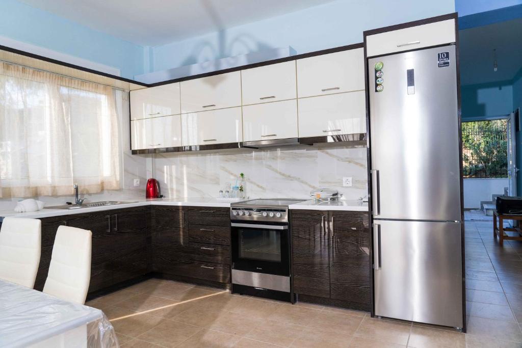 A kitchen or kitchenette at Seaside Apartments
