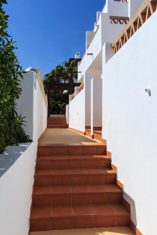a set of stairs leading up to a house at Hostal El Dorado in San José