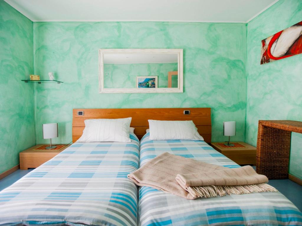 Posteľ alebo postele v izbe v ubytovaní Apartment Bellavista by Interhome