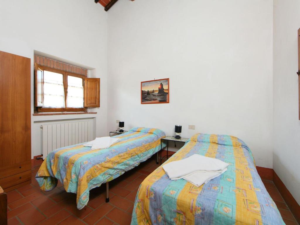 Posteľ alebo postele v izbe v ubytovaní Holiday Home Lo Scoiattolo n- 10 by Interhome