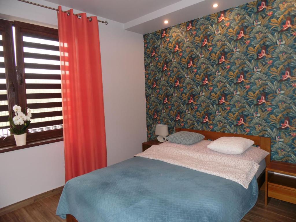 Postel nebo postele na pokoji v ubytování Zielone Zacisze