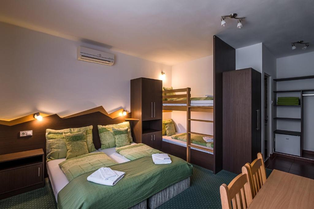 Postel nebo postele na pokoji v ubytování Babi Guesthouse - Babi Vendégház