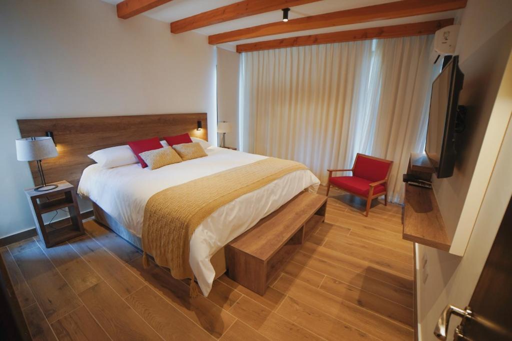 Postel nebo postele na pokoji v ubytování AWKA Apart Hotel