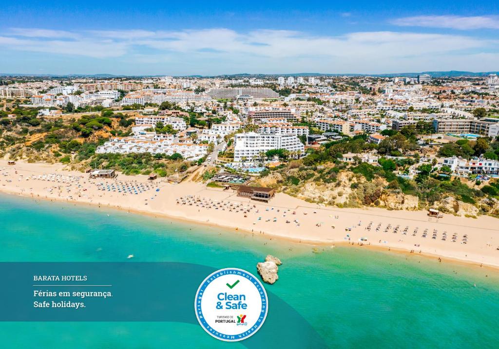 an aerial view of a beach with a group of people at Monica Isabel Beach Club in Albufeira