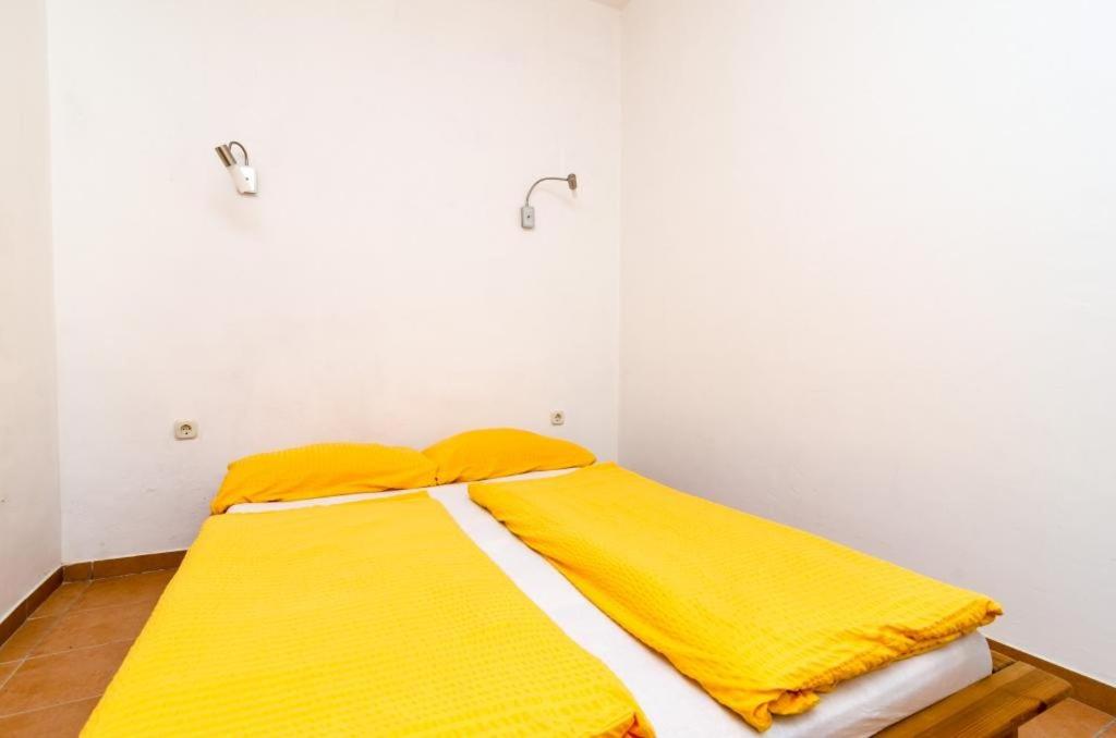 Posteľ alebo postele v izbe v ubytovaní Apartments Lemeš