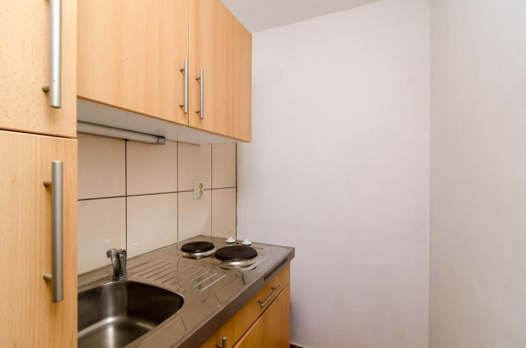 Kuchyňa alebo kuchynka v ubytovaní Apartments Lemeš