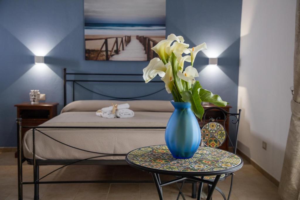 Postel nebo postele na pokoji v ubytování B&B Palazzo Loreto