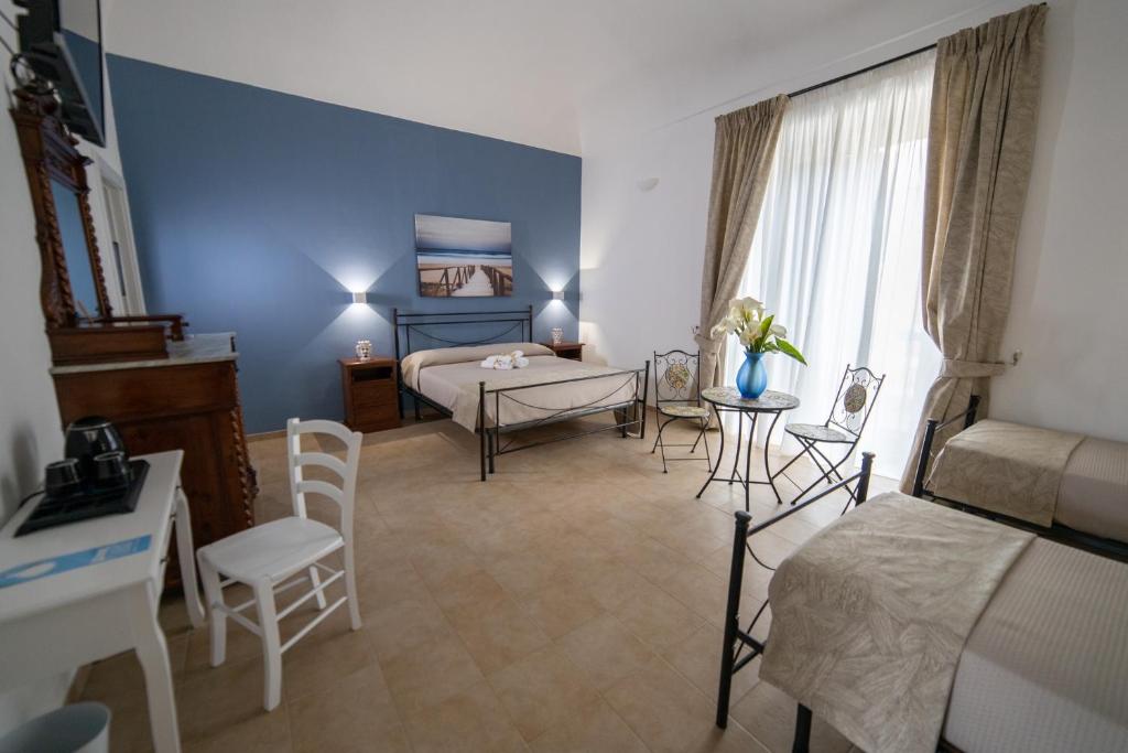 TV a/nebo společenská místnost v ubytování B&B Palazzo Loreto