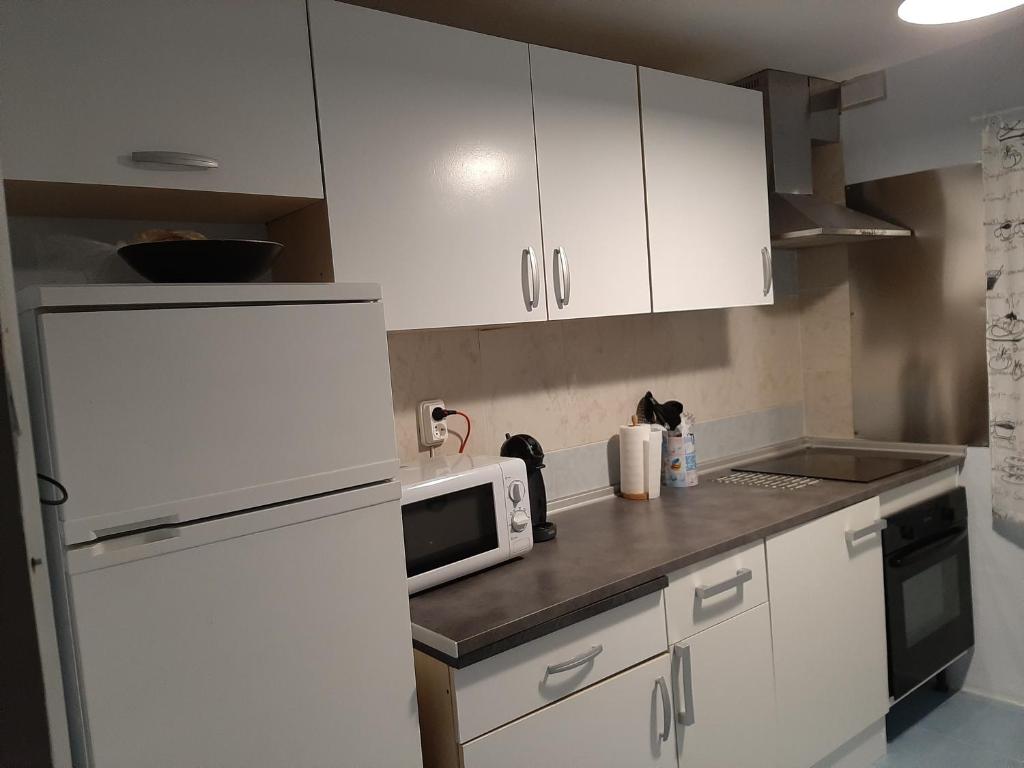 A kitchen or kitchenette at CASA RURAL "ECCEHOMO de BORJA"