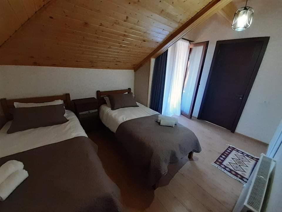 Postel nebo postele na pokoji v ubytování Davit batoni Guest house