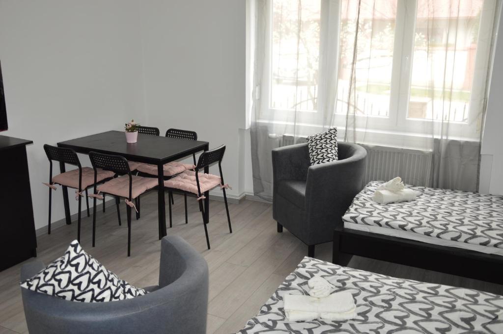 Postel nebo postele na pokoji v ubytování Apartman-Tata