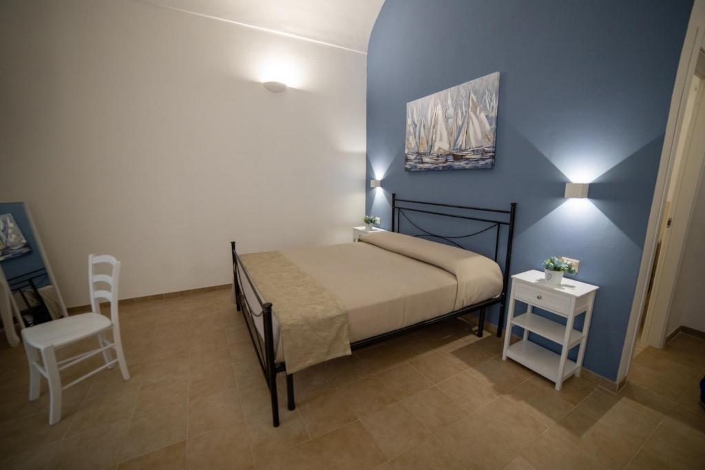 Postel nebo postele na pokoji v ubytování B&B Palazzo Loreto