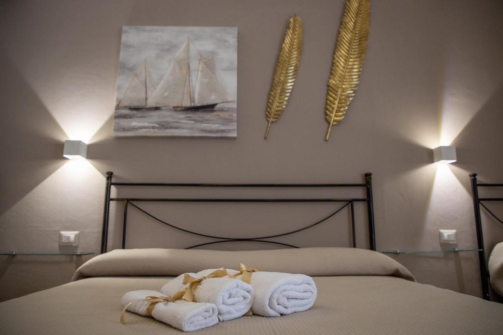 Postel nebo postele na pokoji v ubytování B&B Palazzo Loreto