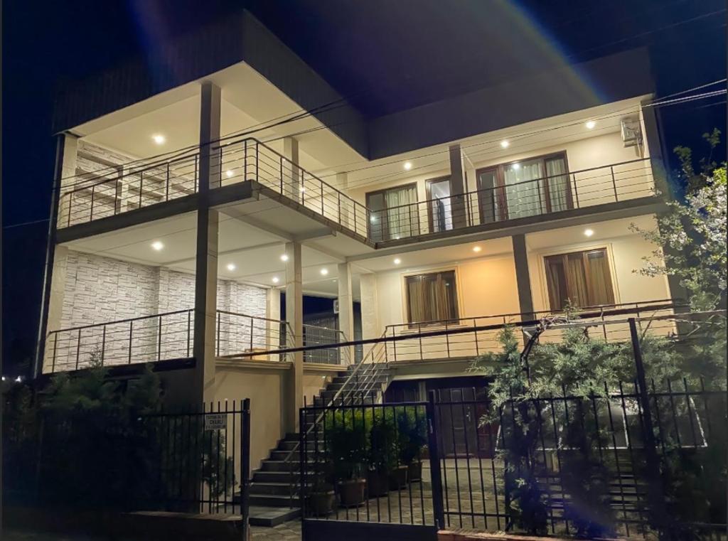 a building with a staircase in front of it at Hotel Charli in K'obulet'i