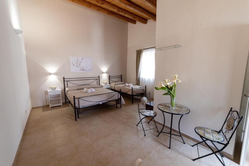 Postel nebo postele na pokoji v ubytování B&B Palazzo Loreto