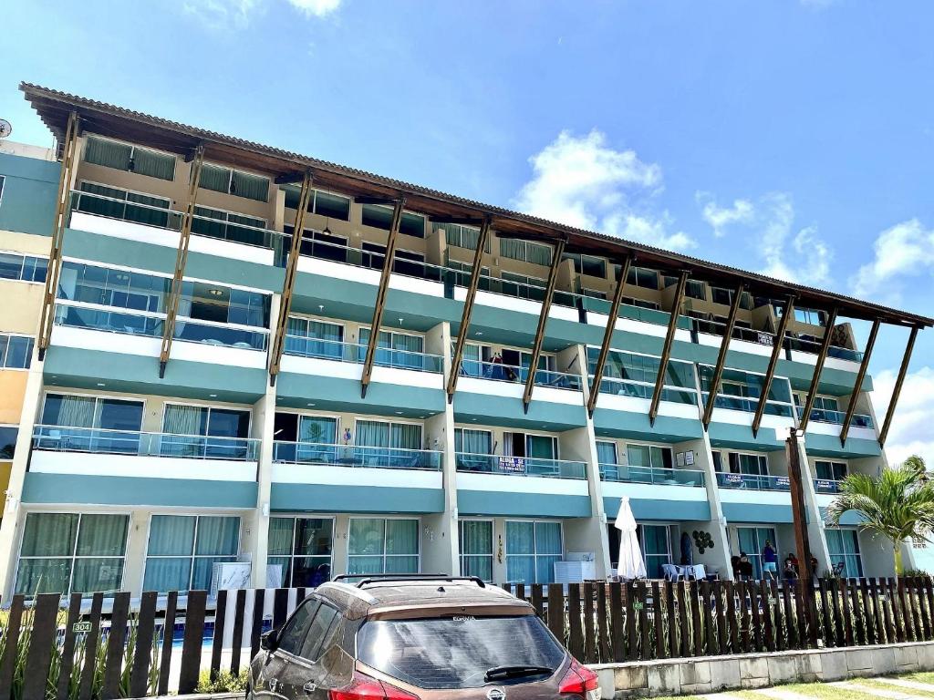  Apto no Villas do Atlântico com vista piscina próximo ao mar por Carpediem