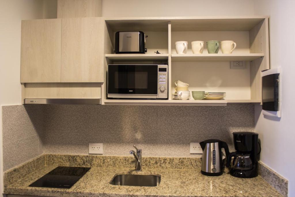 Kuchyň nebo kuchyňský kout v ubytování AWKA Apart Hotel