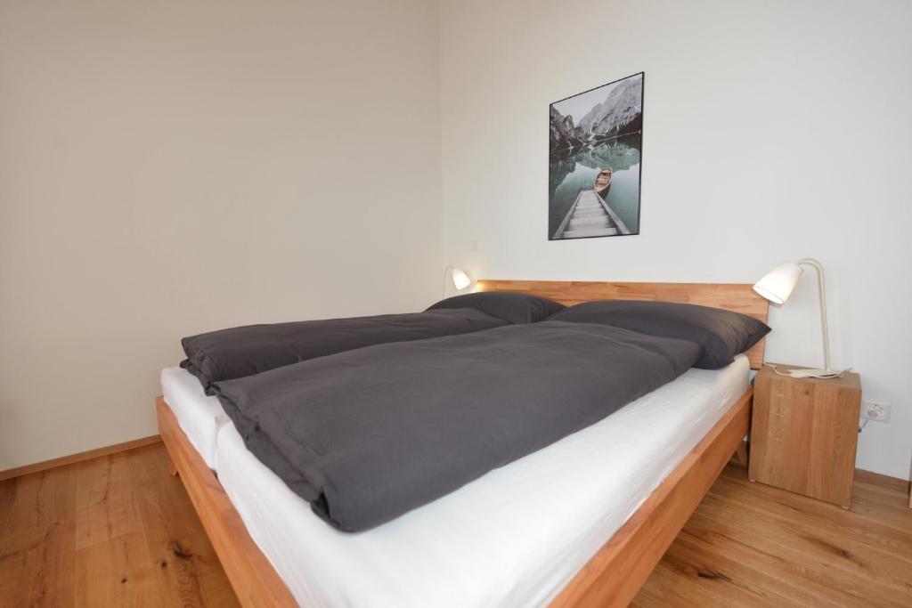 Krevet ili kreveti u jedinici u objektu Alpen-Park Dachwohnung West