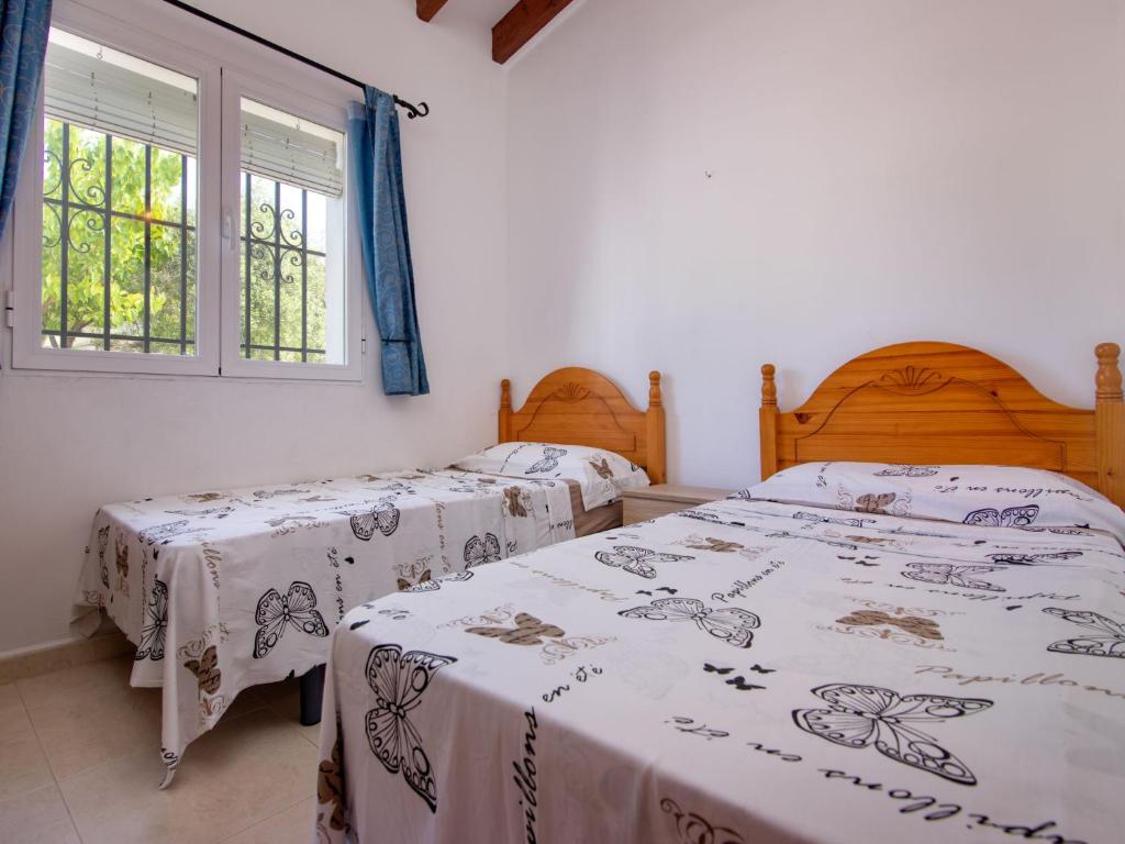 Posteľ alebo postele v izbe v ubytovaní Holiday Home Villa Jana by Interhome