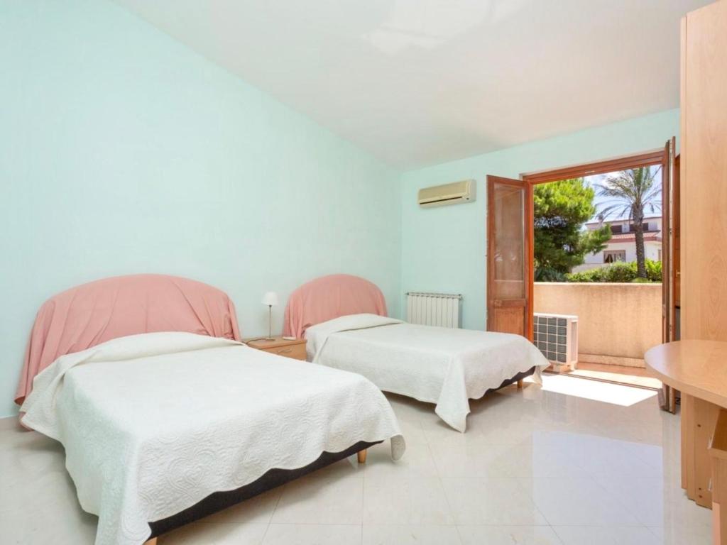 Posteľ alebo postele v izbe v ubytovaní Villa Vittoria by Interhome