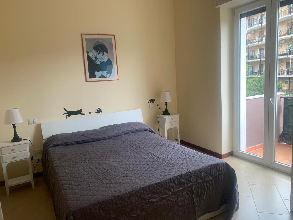 A bed or beds in a room at Residenza Giovanni Paolo Secondo- Casa sull’albero