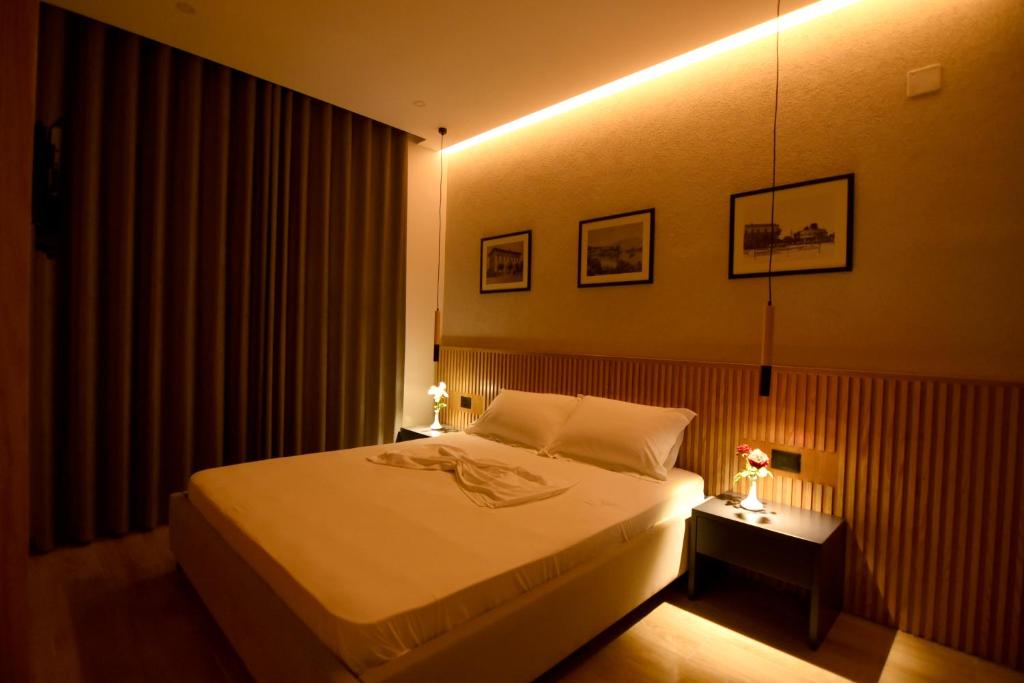 Postel nebo postele na pokoji v ubytování Hotel Ramosaco, Radhimë, Vlorë