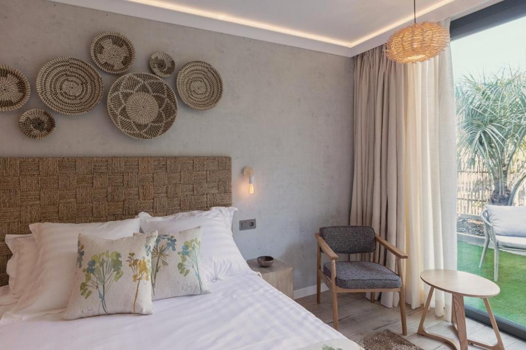 Postel nebo postele na pokoji v ubytování Casa Coco Boutique Hotel & Spa 4*S - Adults Only