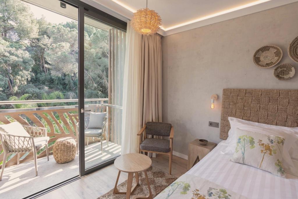 Postel nebo postele na pokoji v ubytování Casa Coco Boutique Hotel & Spa 4*S - Adults Only