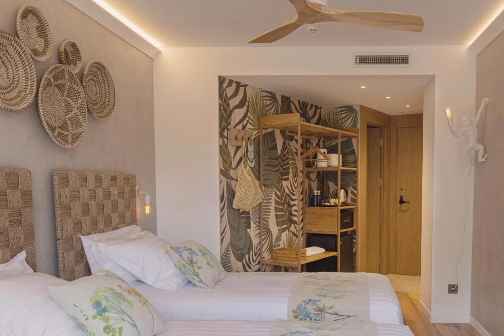 Postel nebo postele na pokoji v ubytování Casa Coco Boutique Hotel & Spa 4*S - Adults Only