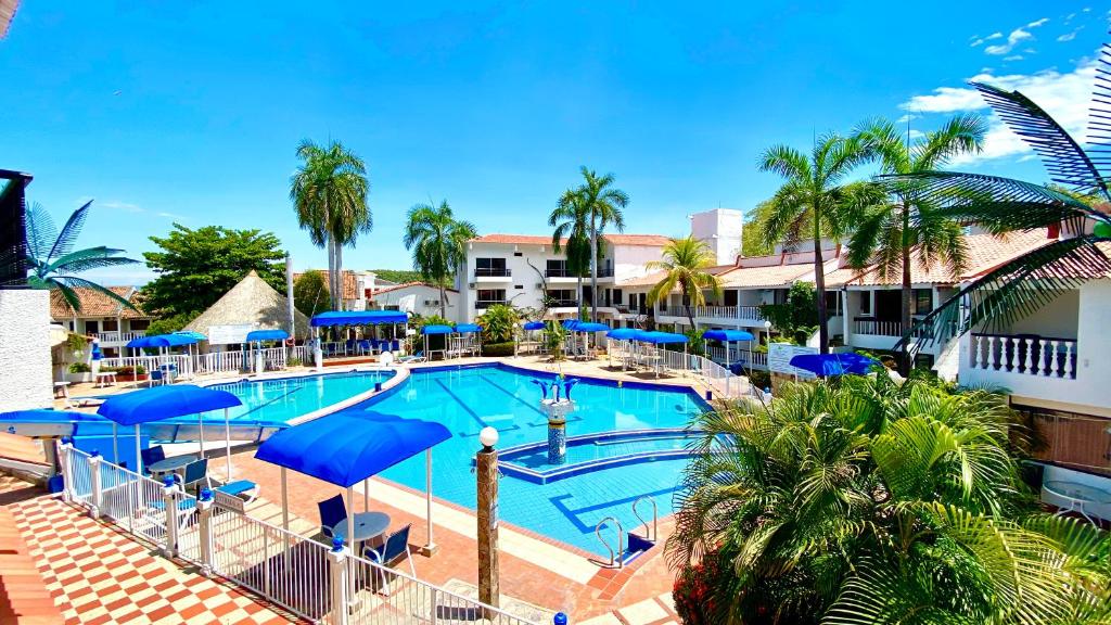 Bazén v ubytování Alborada Hotel Melgar nebo v jeho okolí
