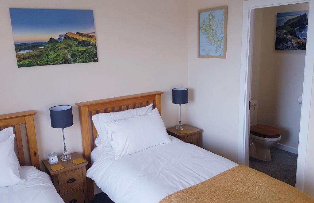 Postel nebo postele na pokoji v ubytování Moorside Rooms