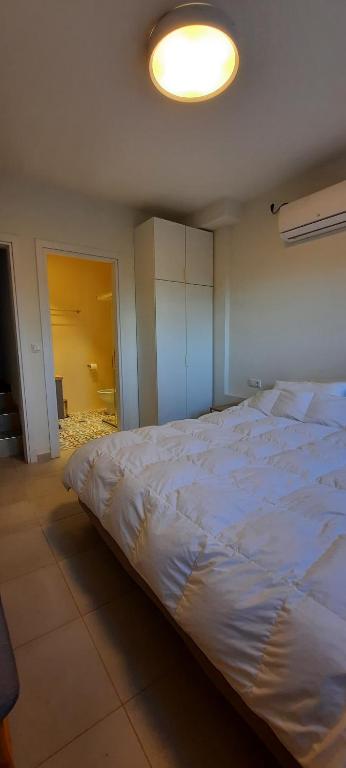 Postel nebo postele na pokoji v ubytování Kastania Villas- Villa K3