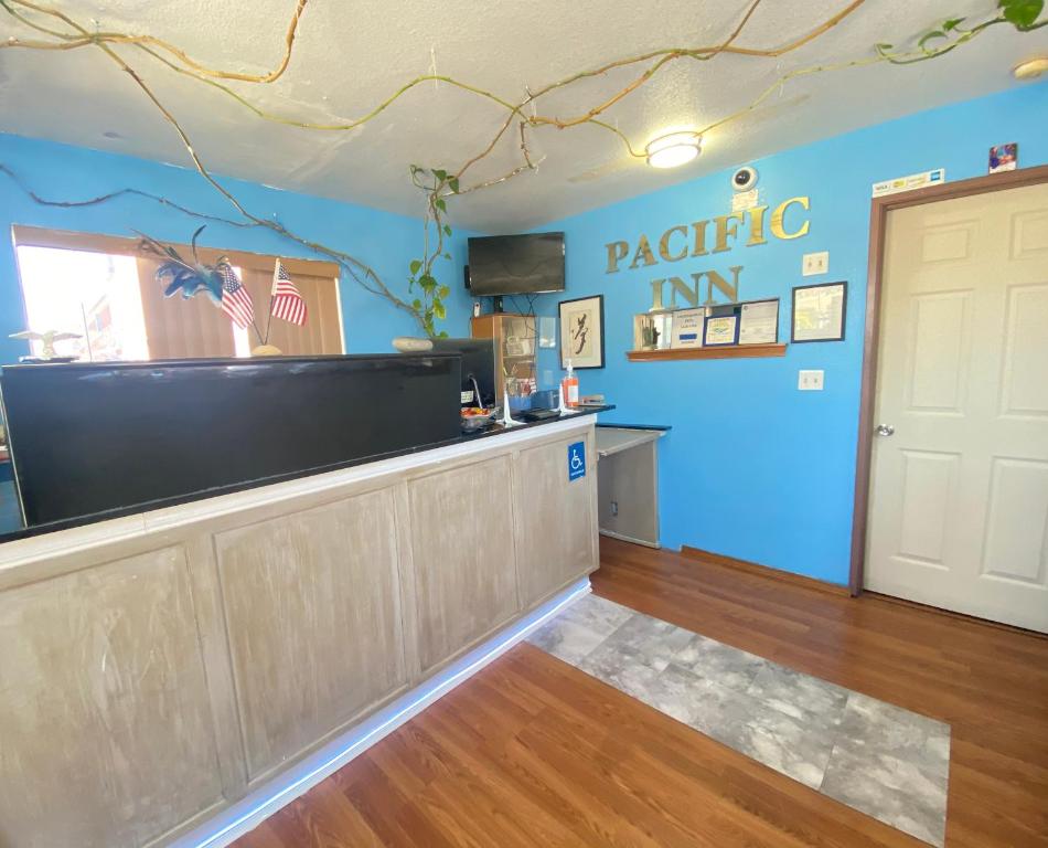 Kuchyň nebo kuchyňský kout v ubytování Pacific Inn