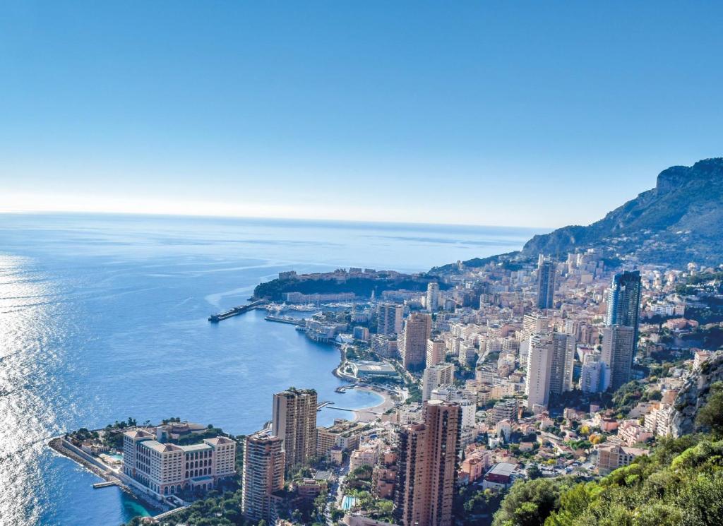 an aerial view of a city next to the water at Monaco view, pool, garage, 100 m2 terrace in Beausoleil